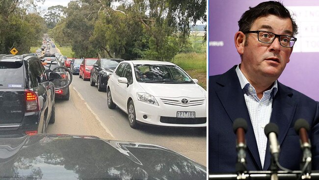 Melbourne residents jam the road near Lysterfield Park in Melbourne.