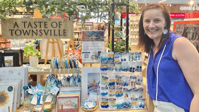 Townsville artist Brenda Stone is a vendor at the airport selling locally handmade art, earrings ornaments and more.