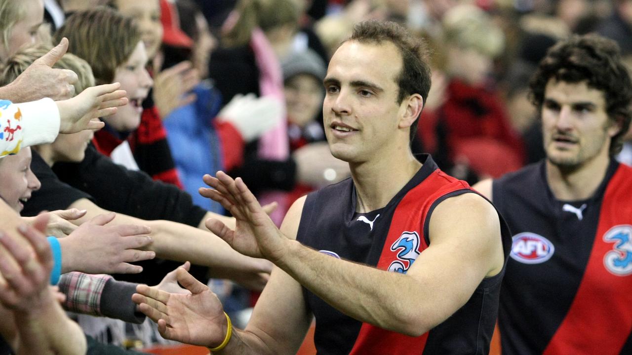 Adam Ramanauskas high fives the crowd in his last game for Essendon in 2008.