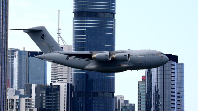 A Globemaster C-17 aircraft conducting a fly-over of Brisbane for Riverfire. Picture: AAP image/David Clark