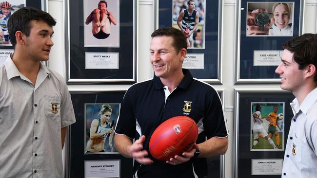 Mark Bickley (centre) with Immanuel first XVII players James Reuther (L) and Fraser Agnew (R). Bickley will coach the college’s side in 2021. Picture: Supplied, Immanuel College