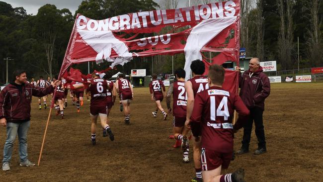 Steve Martin runs through the banner ahead of his milestone match.