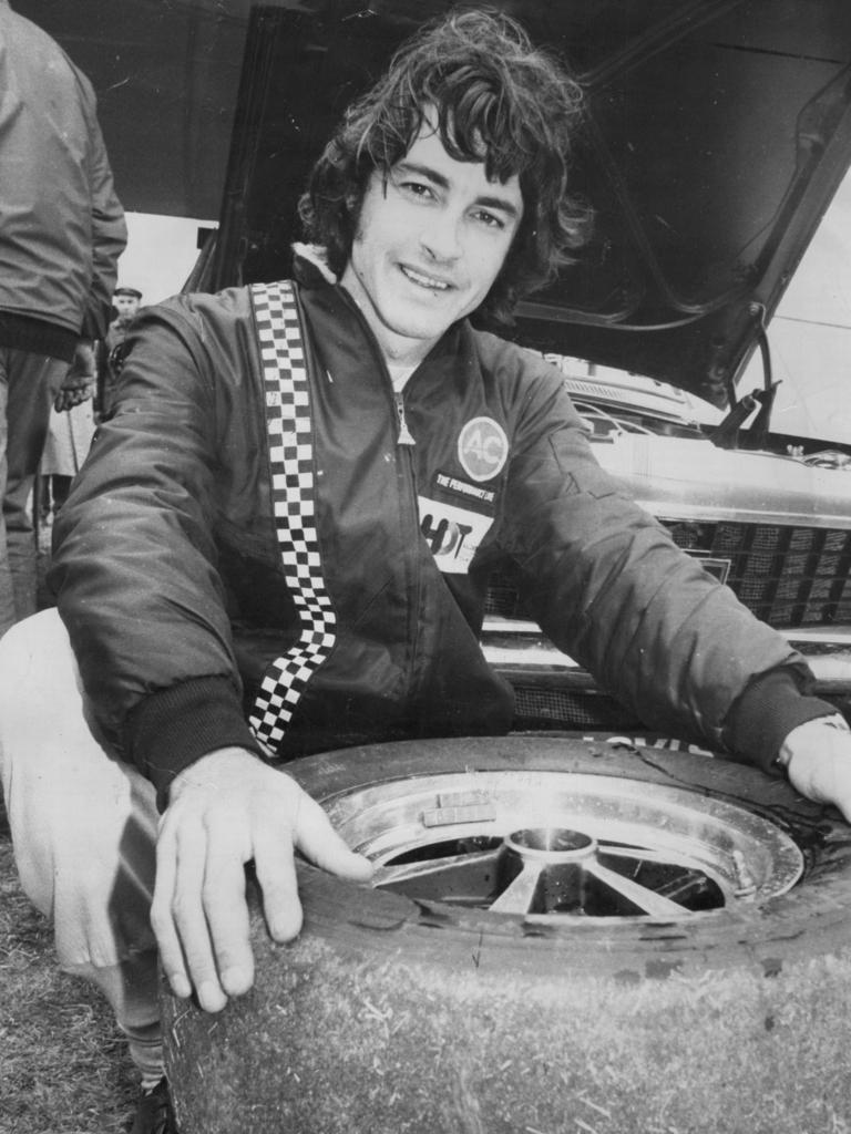 Car racing driver Peter Brock checks tyres for his Holden Torana XU-I 01/10/1972. Picture: Supplied