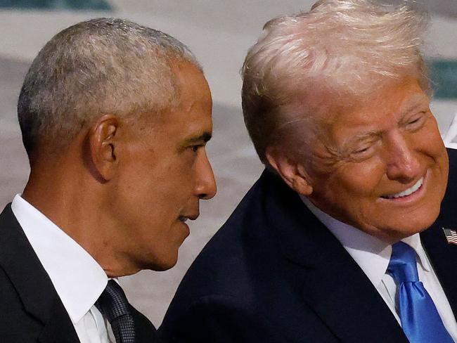 WASHINGTON, DC - JANUARY 09: U.S. President-elect Donald Trump speaks with former U.S. President Barack Obama as Melania Trump looks on during the state funeral for former U.S. President Jimmy Carter at Washington National Cathedral on January 09, 2025 in Washington, DC. President Joe Biden declared today a national day of mourning for Carter, the 39th President of the United States, who died at the age of 100 on December 29, 2024 at his home in Plains, Georgia.   Chip Somodevilla/Getty Images/AFP (Photo by CHIP SOMODEVILLA / GETTY IMAGES NORTH AMERICA / Getty Images via AFP)