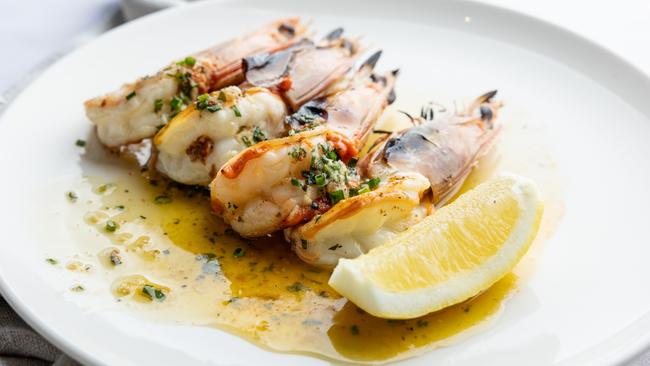 Grilled Mooloolaba prawns, parsley and garlic butter, lemon. Picture: David Kelly