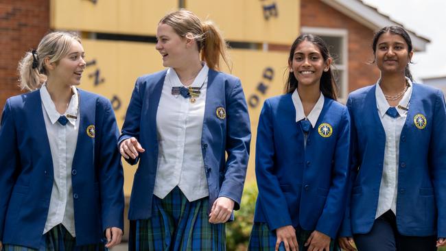 Pictured are Nagle College Blacktown Students Chloe Brown, Isabelle Grills, Theia Nadoda, Chena Shah and Kai McNamara, who described the HSC exam as “surprisingly easy”. Picture: Stuart Matters