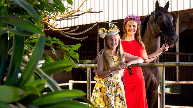 Eloise Watson, 11 and Great Northern Darwin Cup Carnival ambassador Hannah West are pictured with I am the Fox, trained by Garry Lefoe in the lead up to Darwin Cup 2021. Picture: Che Chorley