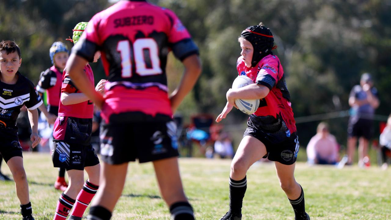 Rouse Hill Rhinos player Cooper Plumner runs the ball. (AAP IMAGE / Angelo Velardo)