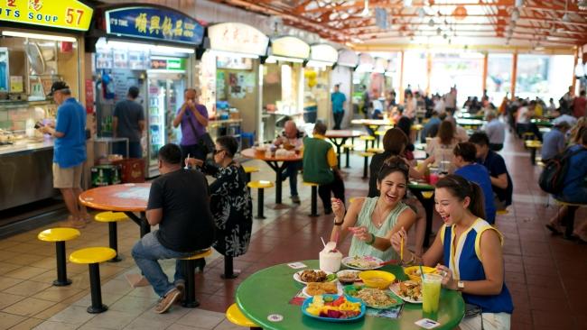 Hawker centre dining is not only delicious, it's cheap and perfect for family meals. Picture: STB