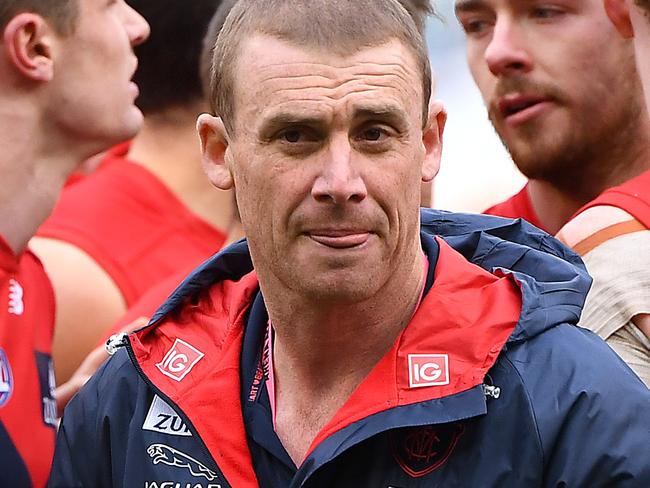 MELBOURNE, AUSTRALIA - AUGUST 10: Demons head coach Simon Goodwin walks away from talking to his players during the round 21 AFL match between the Melbourne Demons and the Collingwood Magpies at Melbourne Cricket Ground on August 10, 2019 in Melbourne, Australia. (Photo by Quinn Rooney/Getty Images)