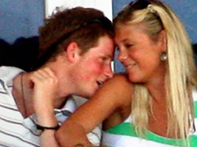 Britain's Prince Harry (L) enjoys a moment with his girlfriend Chelsy Davy as they watch the ICC World Cup Cricket 2007 Super Eight match between Australia and England at the Sir Vivian Richards Stadium in St John's, 08 April 2007. England scored 190-5 at 37 overs play as they elected to bat first after winning the toss. AFP (Photo : Jewel SAMAD)