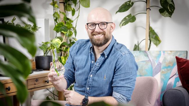 Alex Wright with some of his many plants. Picture: Emma Brasier