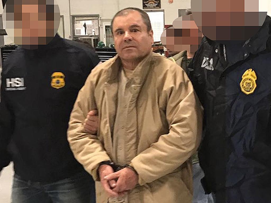 Joaquin "El Chapo" Guzman is escorted by Mexican police as he is extradited to the US in January 2017. Picture: AFP