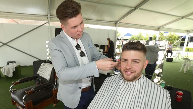 Barber Bro's and Co barber Jesse compagne and racegoer Darvin Sejdic. Picture Mike Batterham