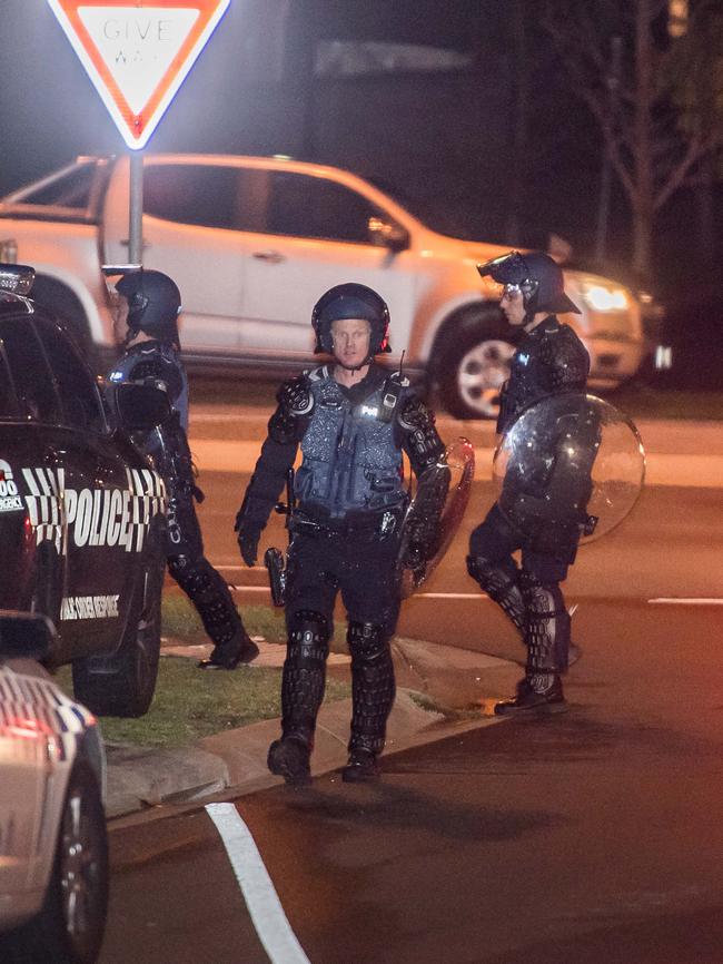 Police wore riot gear for protection. Picture: Jason Edwards