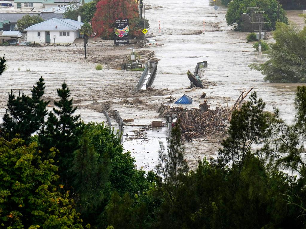 The Waiohiki bridge and surrounds are inundated by the Tutaekuri River near the city of Napier. Picture: AFP