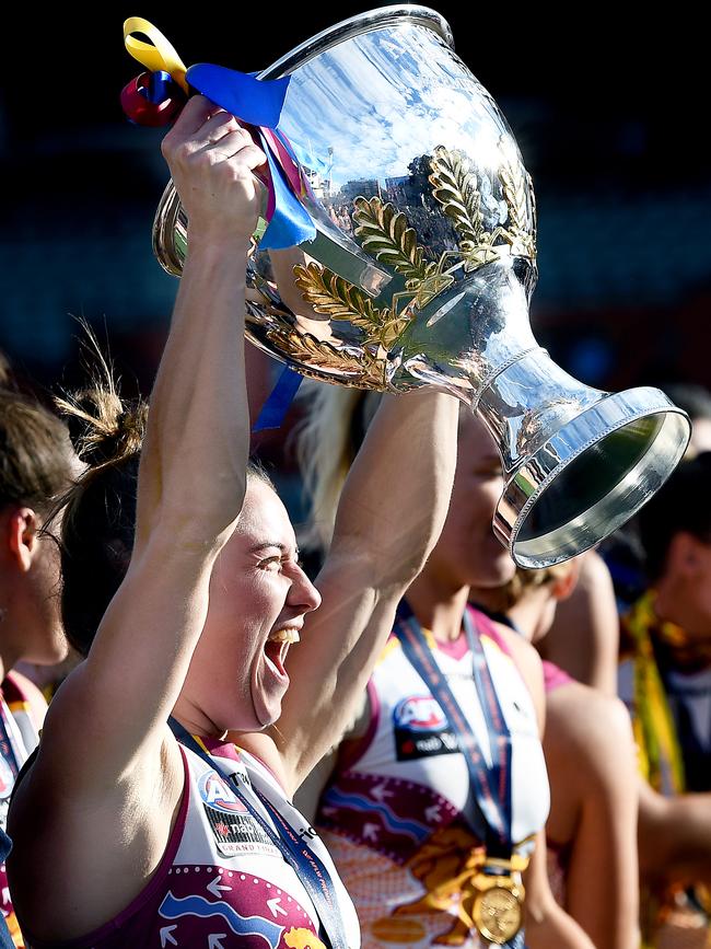 Brisbane captain Emma Zielke triumphantly holds up the premiership cup. Picture: Getty Images