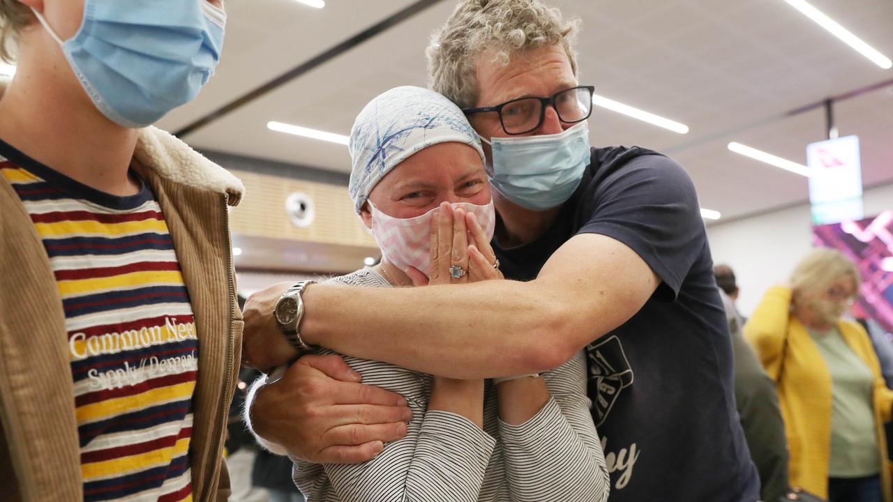 Kate Robertson who has been diagnosed with terminal cancer with son Noah and partner Nic Robertson waiting to meet her parents and two sisters who were arriving from the United Kingdom to see each other after 3 1/2 years. Picture: Nikki Davis-Jones