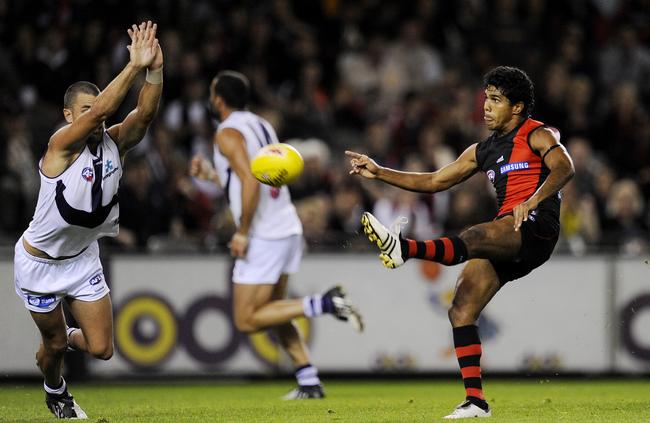 Alwyn Davey kicks in a game against the Fremantle Dockers at the Docklands stadium/ Picture: Colleen Petch