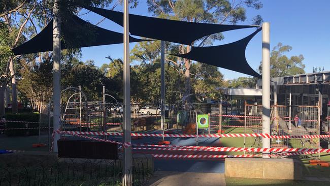 Northern Beaches Council taped off a children's playground at the Killarney Heights shopping precinct in Tremore Pl on Thursday. Picture: Jim O’Rourke