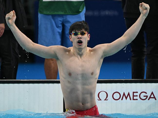 China's Pan Zhanle reacts after winning gold and breaking the world record in Olympic 100m final. Picture: AFP