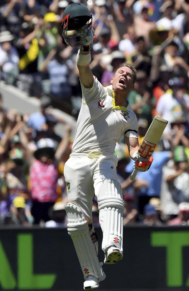 Australia's David Warner celebrates scoring a century against England