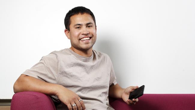 Product specialist Noa Yap, 26, recently switched telco providers saving himself $45 a month on his phone bills. He switched from paying $70 per month with Vodafone to $25 per month or $300 per year with Boost Mobile. Pictured at work in Belrose. Picture: Jonathan Ng