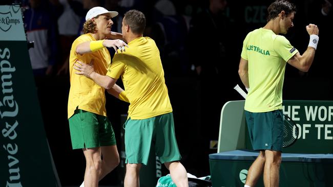 Lleyton Hewitt celebrates Australia’s win over the Czech Republic with doubles stars Max Purcell and Matt Ebden. Picture: Clive Brunskill/Getty Images for ITF