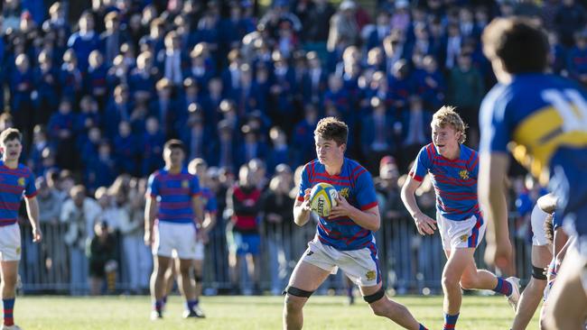 Mackenzie Koch with the ball for Downlands in O'Callaghan Cup on Grammar Downlands Day at Toowoomba Grammar School, Saturday, August 19, 2023. Picture: Kevin Farmer