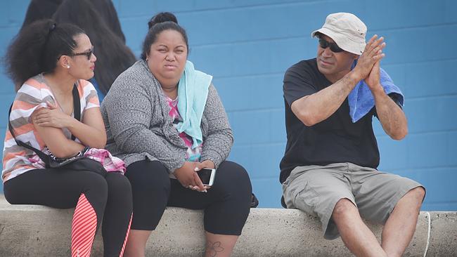 Family and friends wait on Maroubra Beach for any news on missing Teen Tui Gallaher.