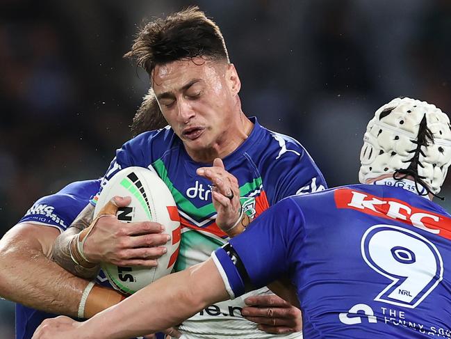 SYDNEY, AUSTRALIA - MAY 12:  Charnze Nicoll-Klokstad of the Warriors is tackled during the round 11 NRL match between Canterbury Bulldogs and New Zealand Warriors at Accor Stadium on May 12, 2023 in Sydney, Australia. (Photo by Brendon Thorne/Getty Images)