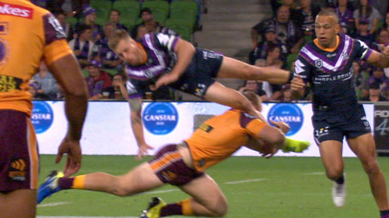 The shocking tackle on Cameron Munster by Brisbane forward Matt Lodge