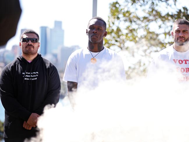 DAILY TELEGRAPH - 5.9.23 MUST NOT PUBLISH BEFORE CLEARING WITH DAILY &amp; WEEKEND TELEGRAPH PIC EDITORS- UFC comes to town for the first time in 7 years. Fighters are pictured at Barangaroo for a Welcome to Country. L got R, Justin Tafa, Israel Adesanya and Tyson Pedro. Picture: Sam Ruttyn