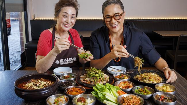 Chef and Powerhouse associate Kylie Kwong enjoys a traditional Korean feast with Jimin “Mama” Park. Picture: Toby Zerna
