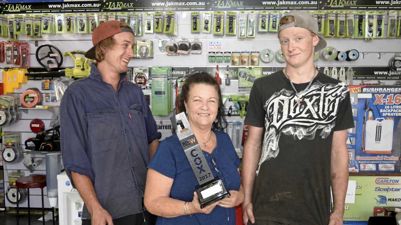 WINNERS: Townsend Mowers owner Lynda Welch (centre) celebrates with Jacob Gordan and Callan Jones after winning the Cox dealership award for highest sales in NSW per capita. Picture: Jarrard Potter