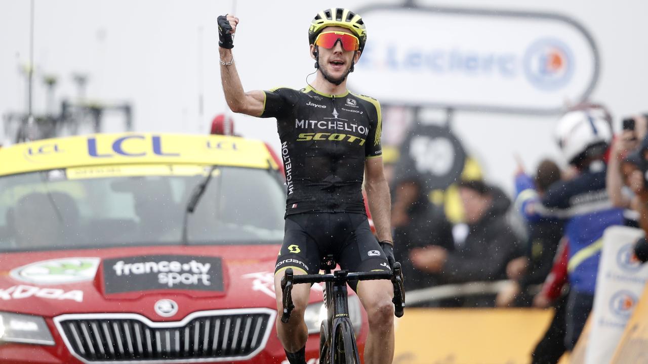 Britain's Simon Yates celebrates as he crosses the finish line.