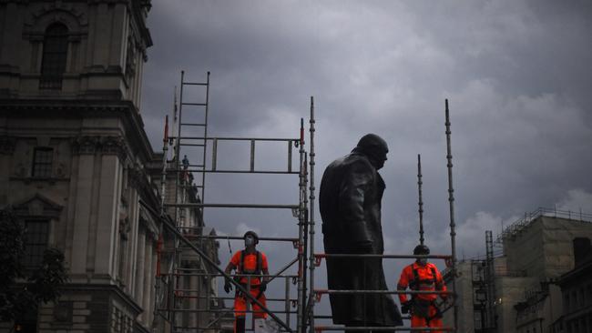 The statue of Winston Churchill in London’s Parliament Square, which was covered to prevent vandalism.