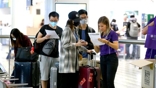 International students from Thai Airways Flight pictured arriving the Brisbane International Airport before starting their university courses.