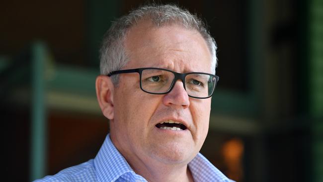 Prime Minister Scott Morrison will force councils to hold citizenships on January 26. Picture: AAP Image/Joel Carrett