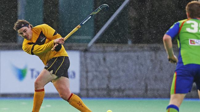 University's player coach Ben Read taking a shot. Picture: Zak Simmonds