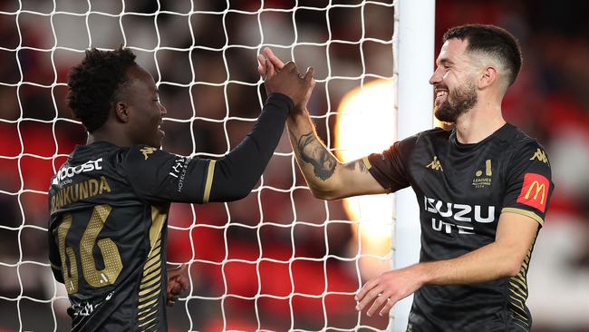 Apostolos Stamatelopoulos (right) celebrates with fellow Socceroo Nestory Irankunda after scoring for the A-League All Stars in May. Picture: Robert Cianflone/Getty Images