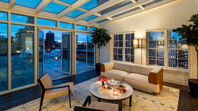 A conservatory space offers a stylish place to unwind, with easy access to the private terrace outside. Picture: The Mark Hotel