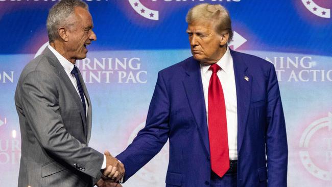 Donald Trump shakes hands with Robert F. Kennedy Jr. Picture: AFP.