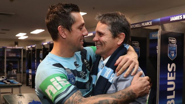 Mitchell Pearce and his father Wayne. Picture: Brett Costello