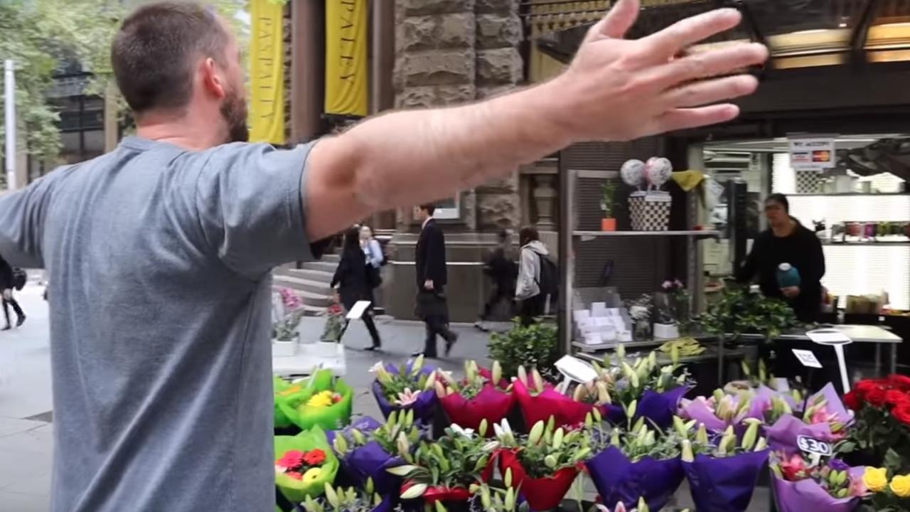 The florist tells the preacher ‘no one cares’ when he won’t stop yelling in the street. Picture: Torch of Christ Ministries