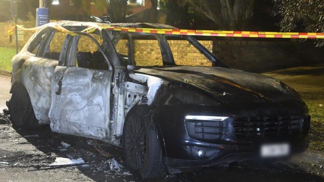 The burnt out car police found after the shooting.