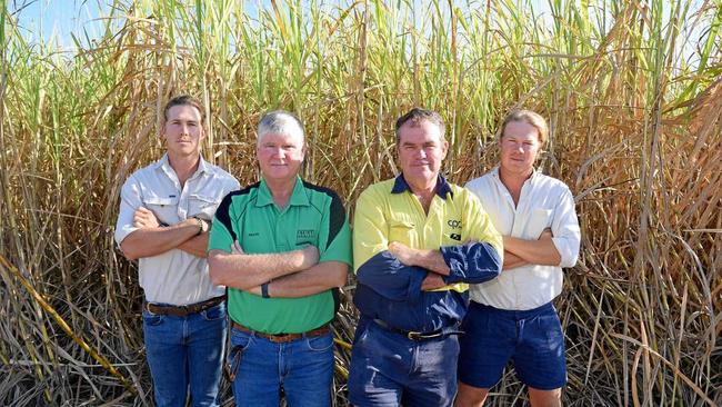 NOT HAPPY: Proserpine cane farmer Peter Faust (second from right) with (from left) son Matt Faust, farm manager Shane Butler and son Peter Faust. Picture: Claudia Alp