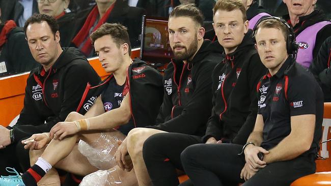 Injured Bombers Orazio Fantasia, Cale Hooker and Brendon Goddard on the bench. Picture: Michael Klein