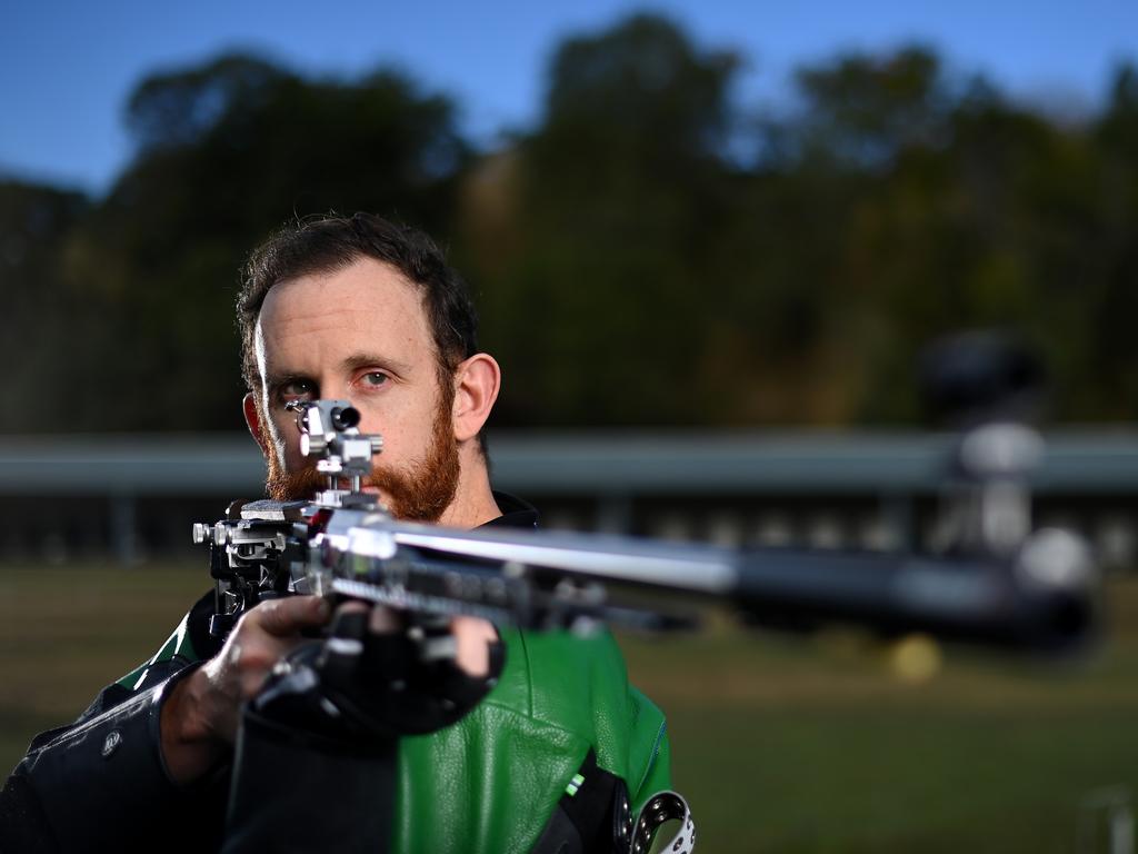 Dane Sampson, 38, poses during the Australian 2024 Paris Olympic Games Shooting Squad announcement at the Brisbane International Shooting Centre in June. Picture: Albert Perez/Getty Images