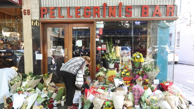 Mourners have turned Pellgrini's into a makeshift shrine today. Picture: Alex Coppel.